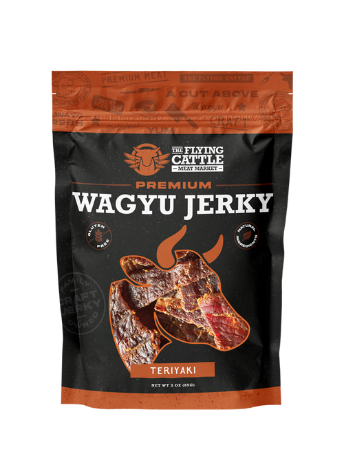 A 3 oz bag of The Flying Cattle Premium Wagyu Jerky, Teriyaki flavor. The packaging is black with orange accents and features a graphic of sliced wagyu jerky.